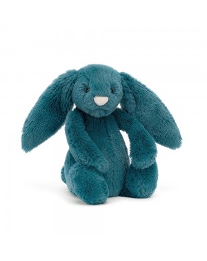 Peluche lapin timide bleu...