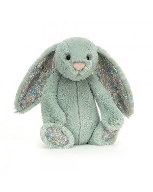 Peluche lapin timide...