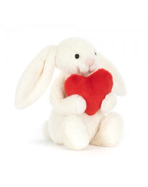 Peluche lapin timide coeur...